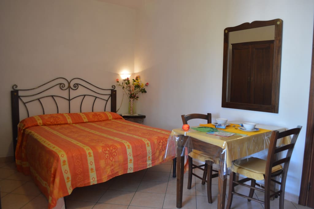 letto e angolo pranzo