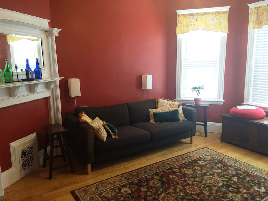 Living room space (space now includes low coffee table and SMART TV with Netflix access.)