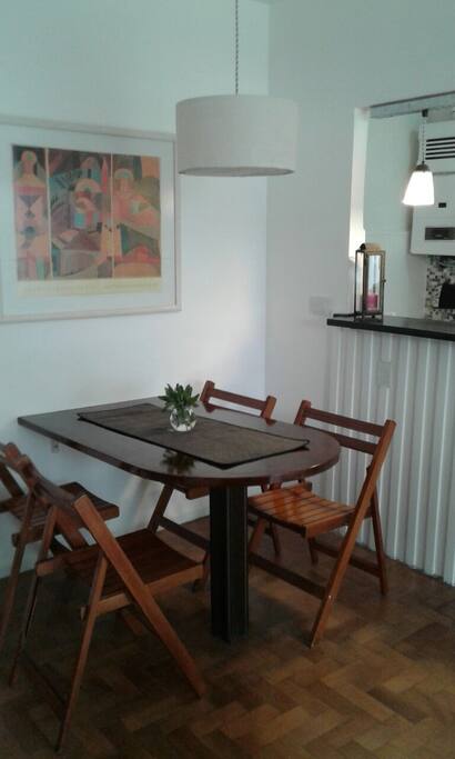 Comfortable dining table with 4 chairs.
