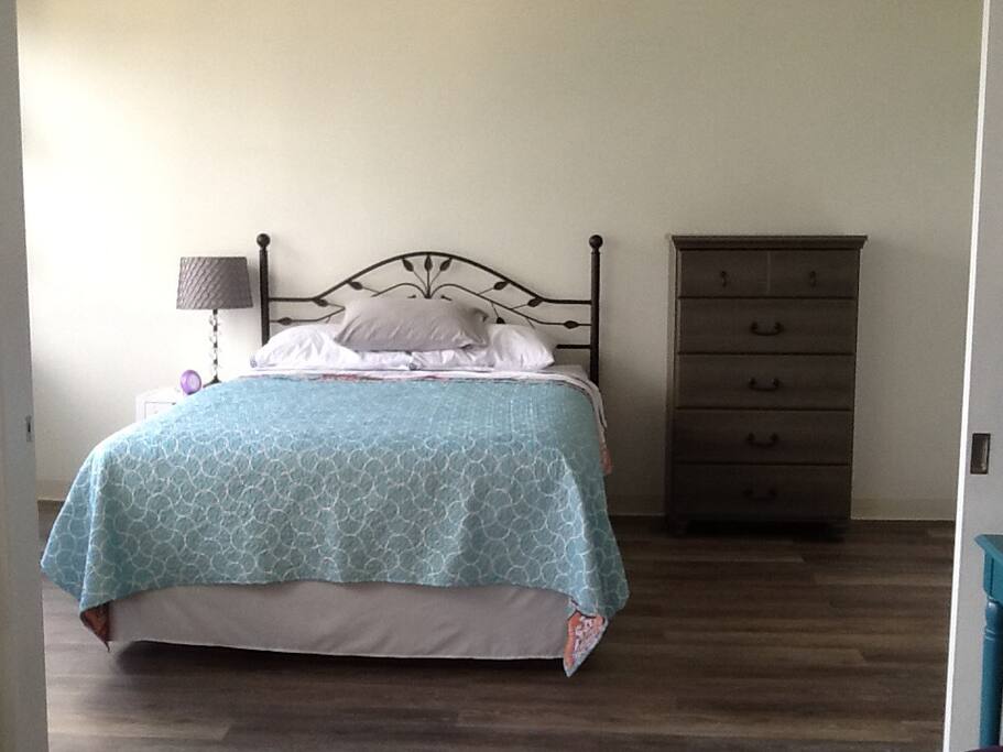 Queen-sized bed, full dresser and closet.