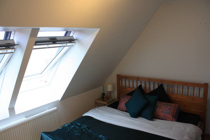 2nd bedroom - Very comfortable king size bed, large windows, and a radiator.