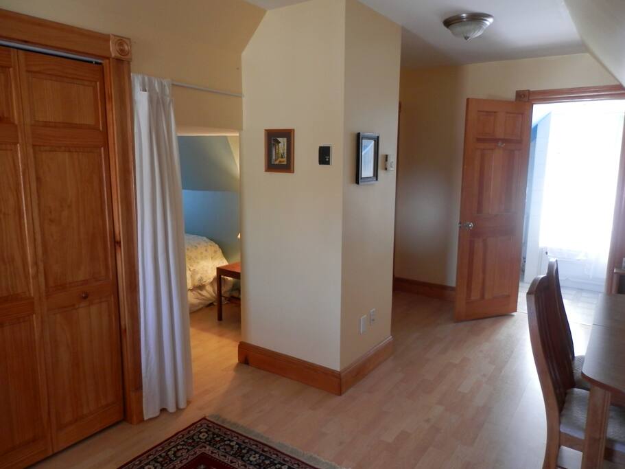 This shows the curtained entrance to the sleeping nook, and the bathroom.
