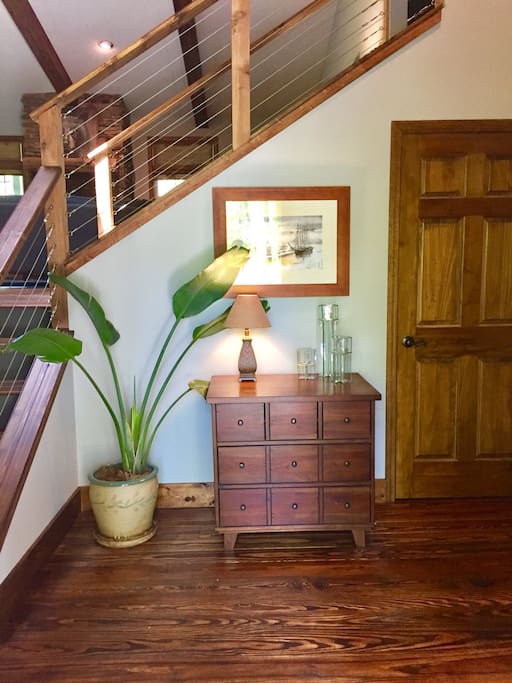 This is the entry foyer of our home. The door to the Waterfall Apartment is pictured on the right.