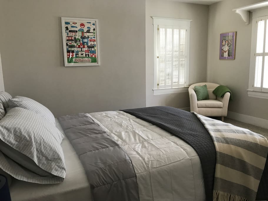 Cozy, light-filled bedroom with brand new Sealy Posturepedic mattress.