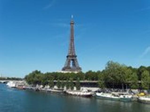 A bedroom near the Eiffel Tower.