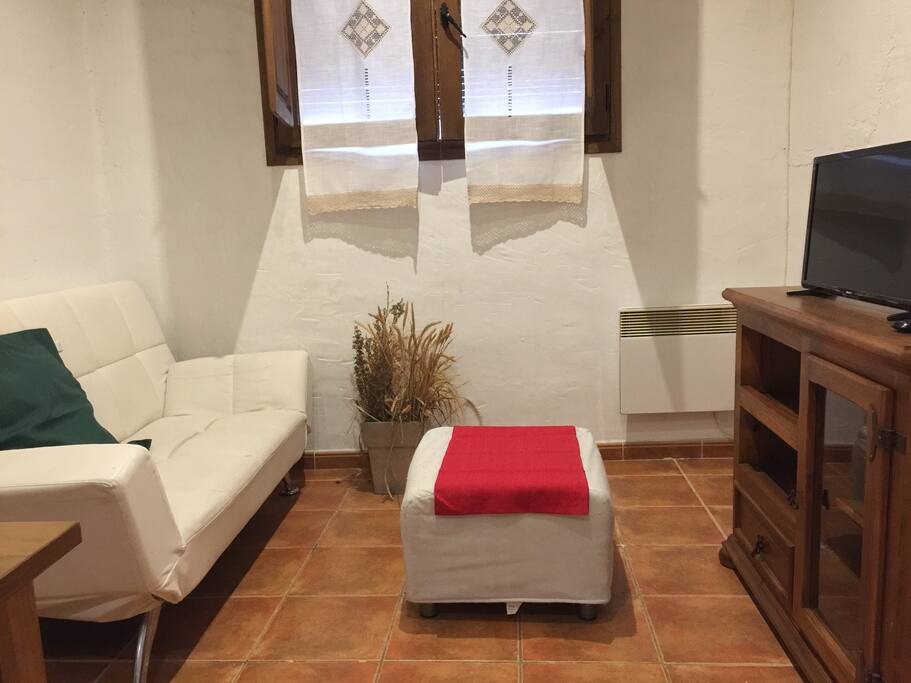 Salón con sofá cama