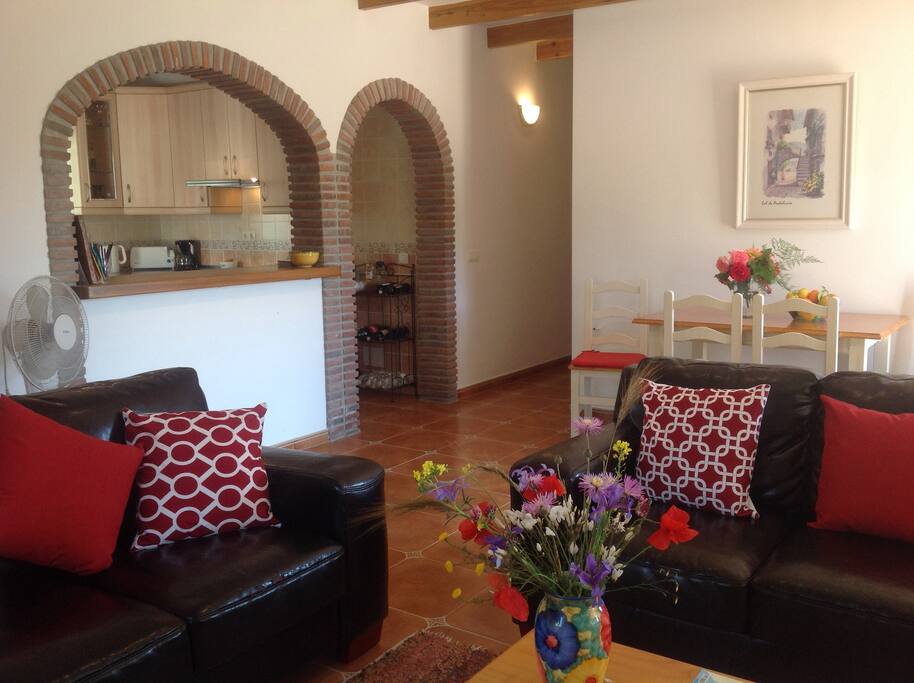The living room open to the kitchen for family entertaining