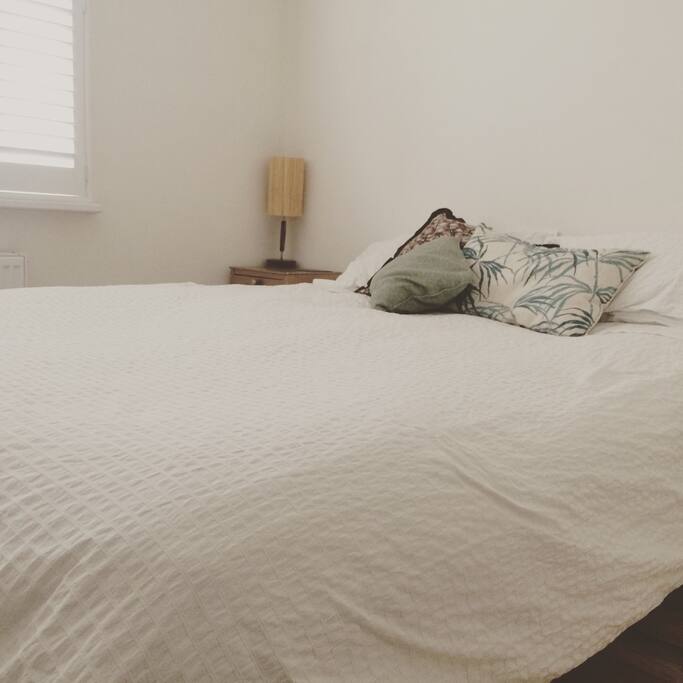 King size bed, with Egyptian cotton sheets