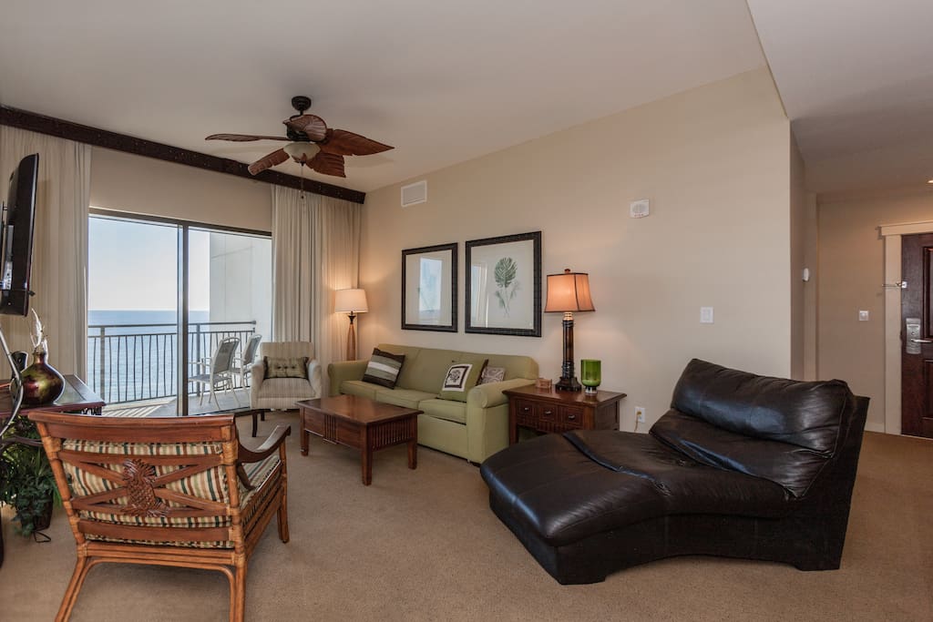 Plenty of seating, sofa sleeper, and 54" flat screen TV in the living room. Complimentary Wi-Fi also provided.