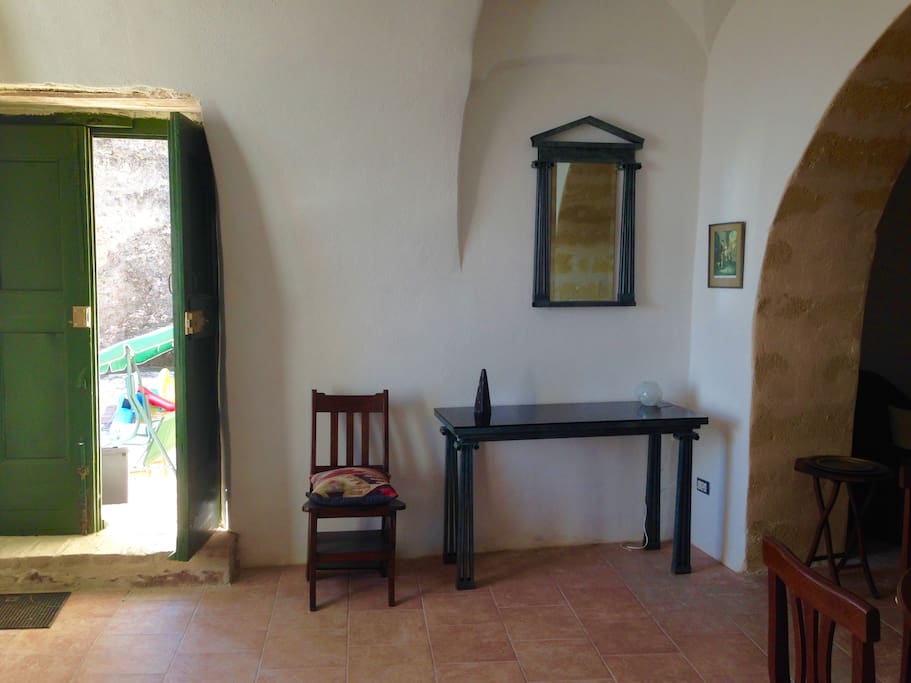 The dining area and front door onto the terrace.