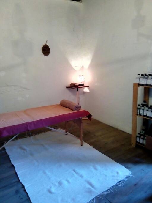 Our treatment room, suitable as a workspace, for yoga practice, meditation or for a session of massage treatment.