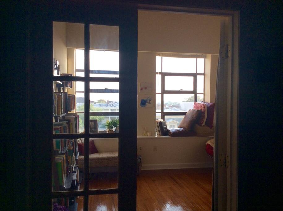 Beautiful glass doors can be kept open for natural lighting or closed for decoration