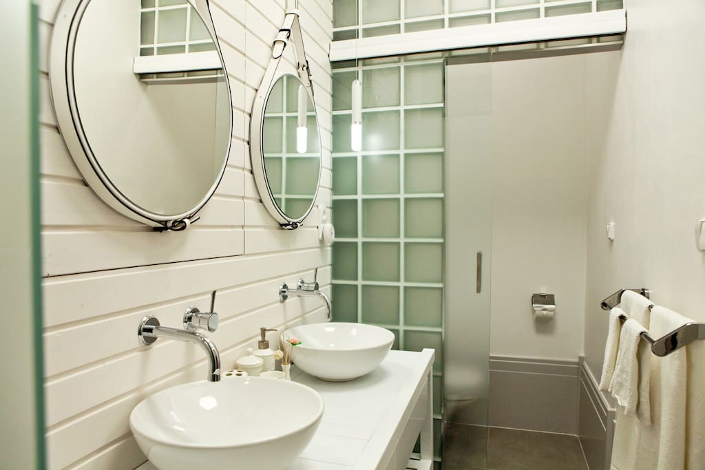 Bathroom with 2sinks and shower! ourmade mirrors!