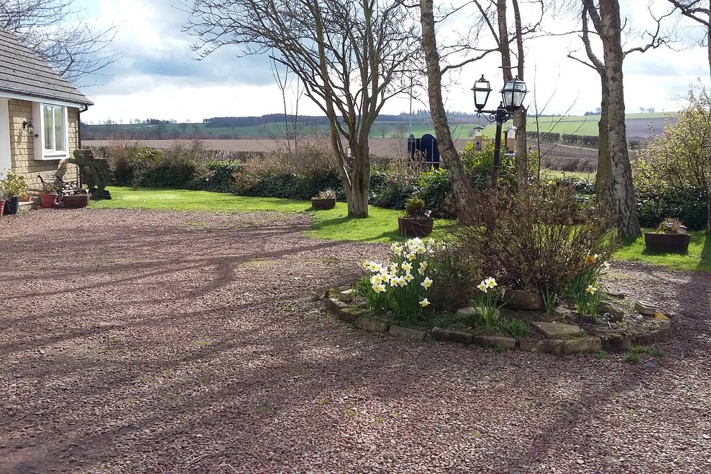 Outside the property. Parking area