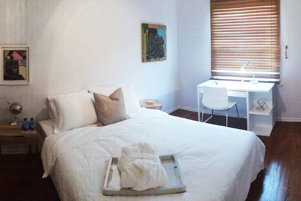Bedroom with Queen Bed and Desk.