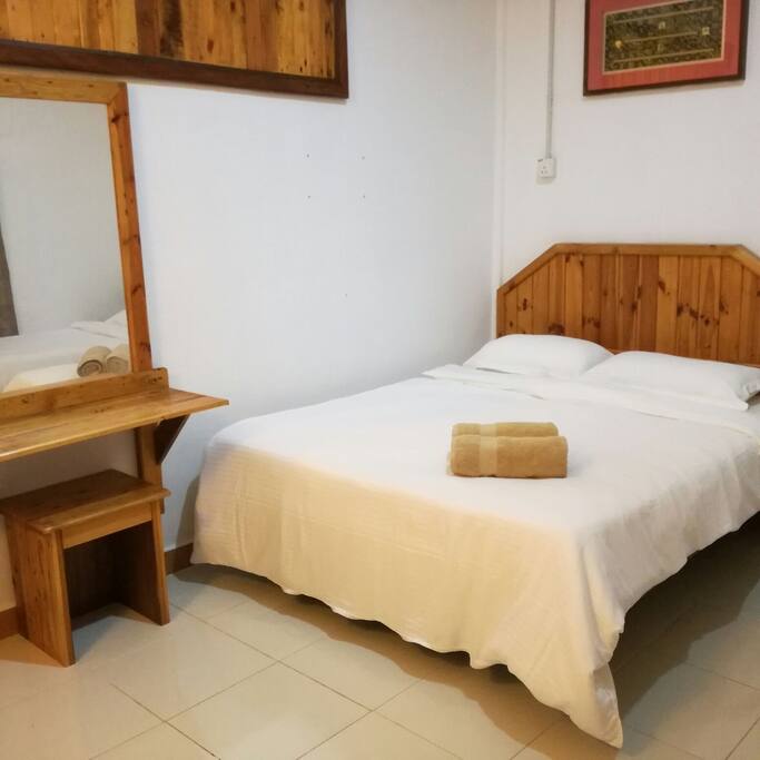 Master bedroom in the Kampong Haus Suite