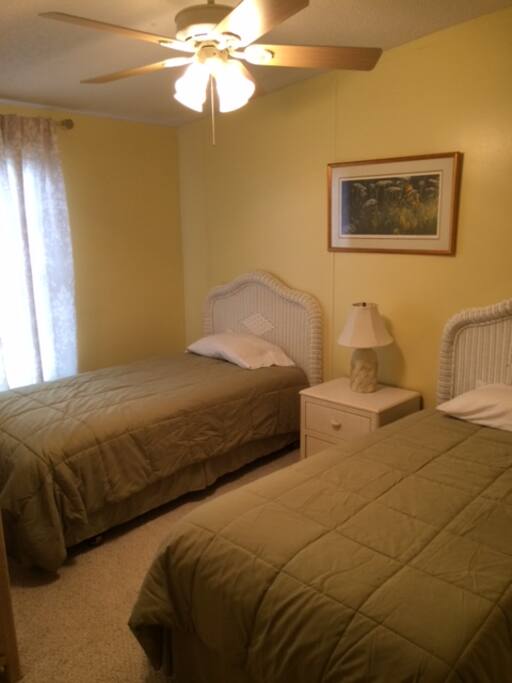 Sunny and bright bedroom with the twin XL beds