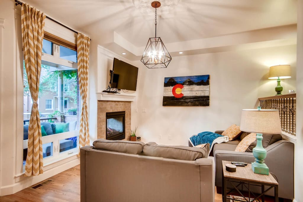 Sunken living room with double sided fireplace.