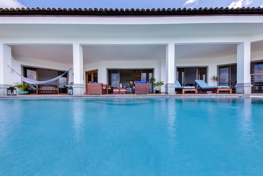 Step off our spacious terrace into the inviting infinity pool