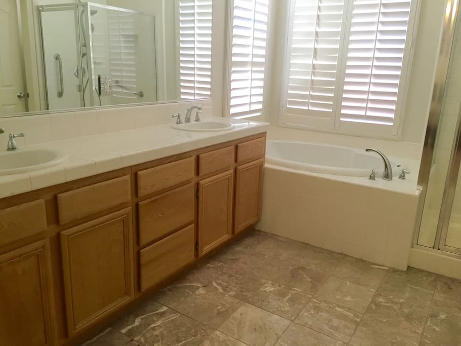 Master Bath with dual sink area, huge hot tub, and separate shower.
