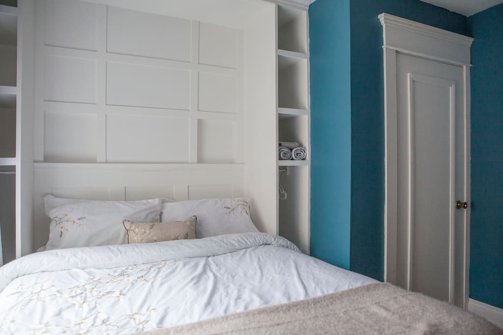 Custom built unit with room to hang clothes on both sides