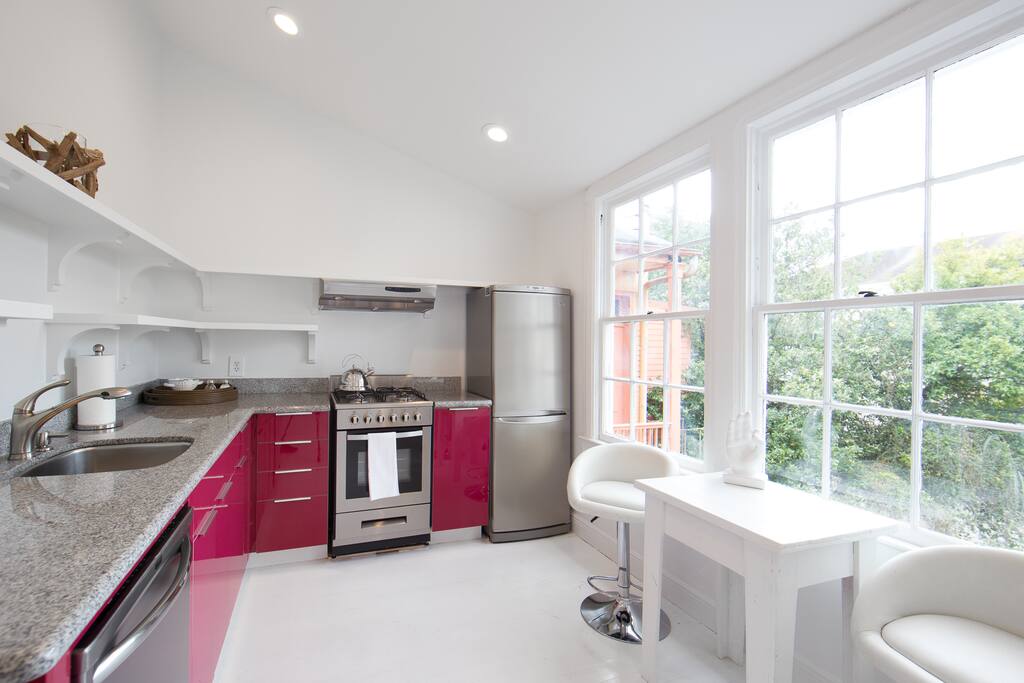 Fully equipped kitchen with lots of light.