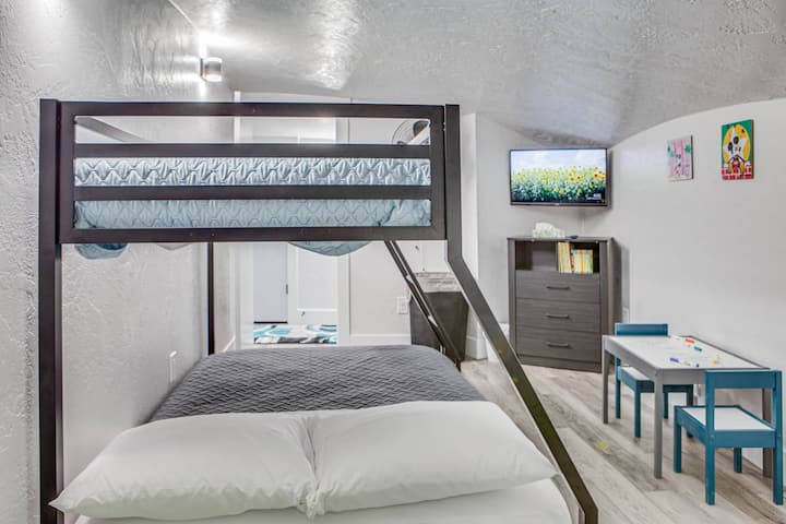 Loft space specifically designed with the smallest family members in mind. Twin over full bunk bed, table for coloring, books so that bedtime stories never have to be missed, and a 32" Vizio smart tv.
Extra fleece blankets stored in dresser drawers.