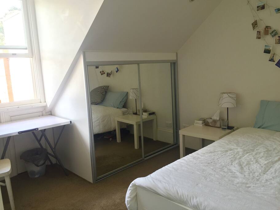 Cupboard space available - shelves and hanger section. Window has curtain that blocks out light well and has great night views of the Westfield tower and the city.