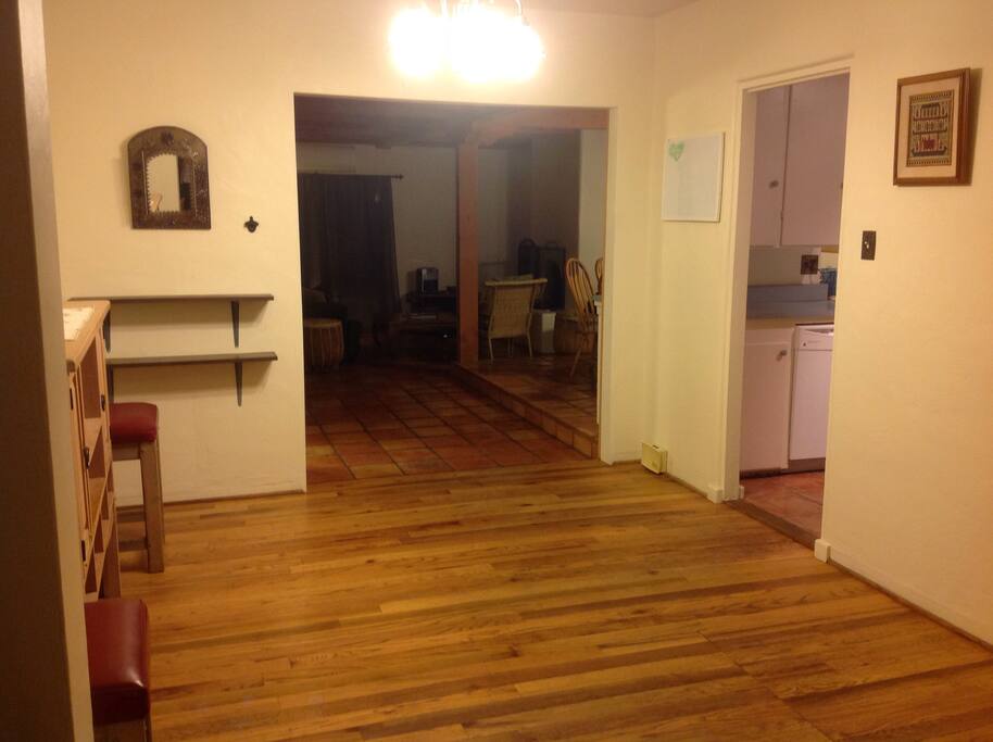 Open space area across from kitchen, between living room and family room.