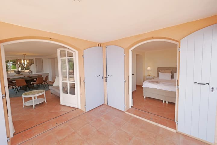 Bottom floor: Dining room and bedroom with on-suite bathroom.
