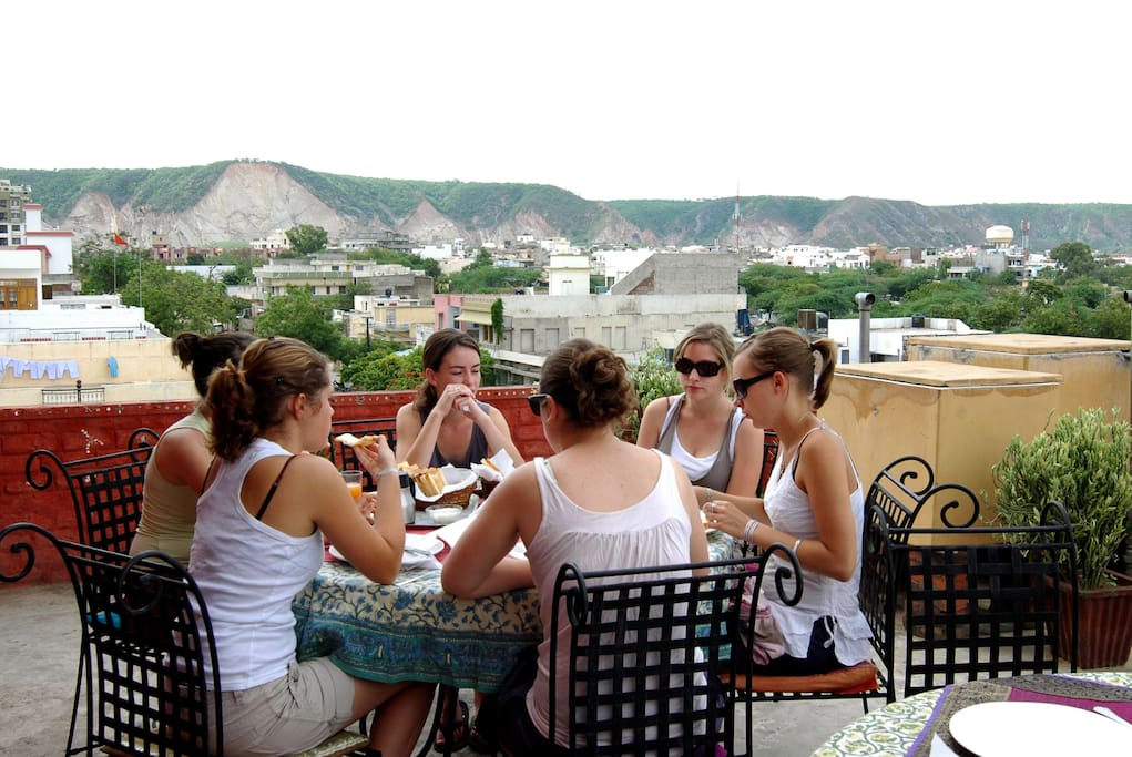 A roof top or terrace where you can enjoy home cooked meals and breakfast in morning.