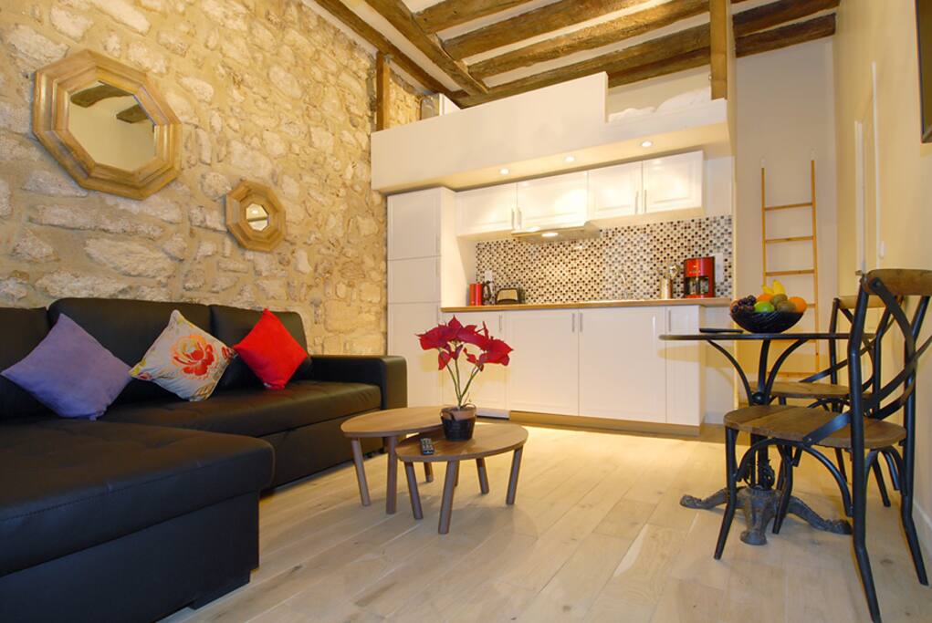 LIVING ROOM + TV + Dining Area + Kitchen + Bathroom behind the kitchen + the mezzanine above the Bathroom