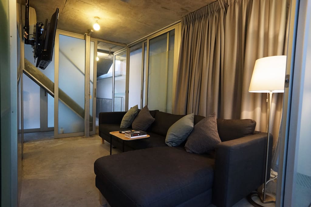Peter (Review) "Thumbs up for the creative design of this BnB, an unusual but funky layout. The rooms are not big, but well laid out. "
Sapporo Loft first level: Big and comfortable sofa that sleeps 2 people!