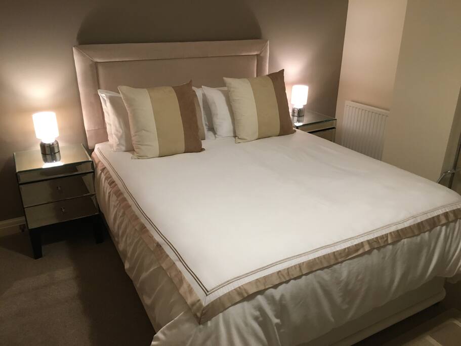 King Size Beds, Bedside cabinets with touch-lamps