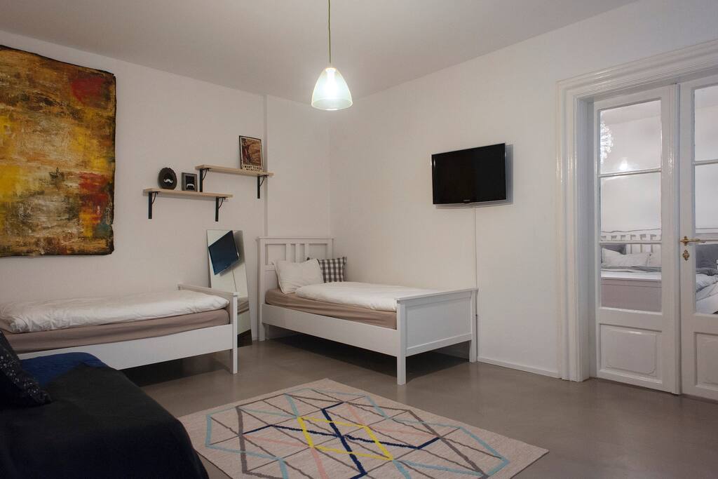 Bedroom with two single beds and TV!