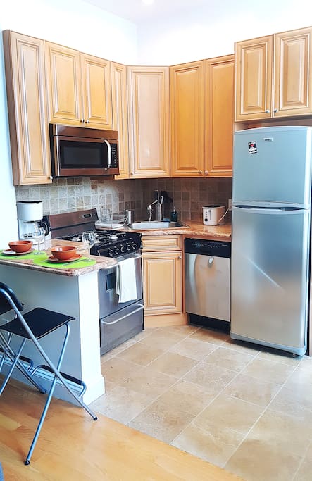 Renovated kitchen with all the appliances to prepare you meals