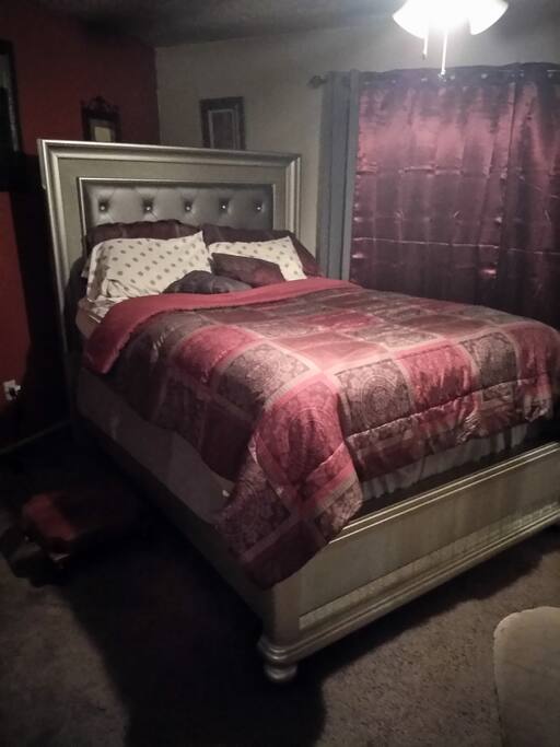 Has a queen-size bed that sleeps two adults