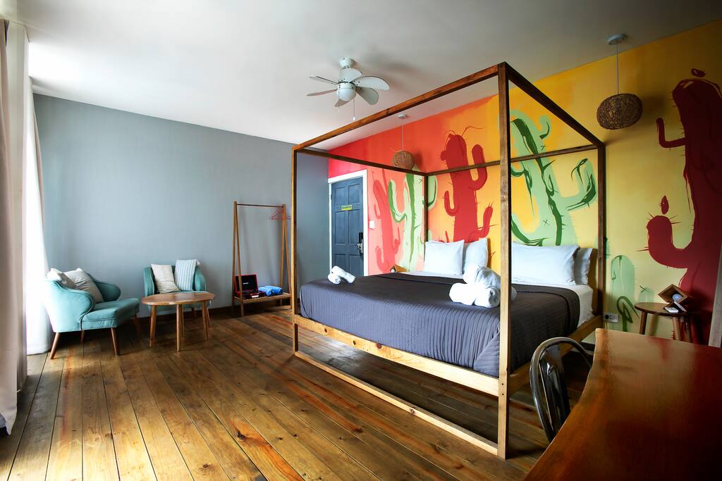 Comfy king size bed!! A spacious designer room with a view of the Caribbean sea. Hotel-level comfort with a contemporary feel. Equipped with a private bathroom and closet for ultimate convenience.