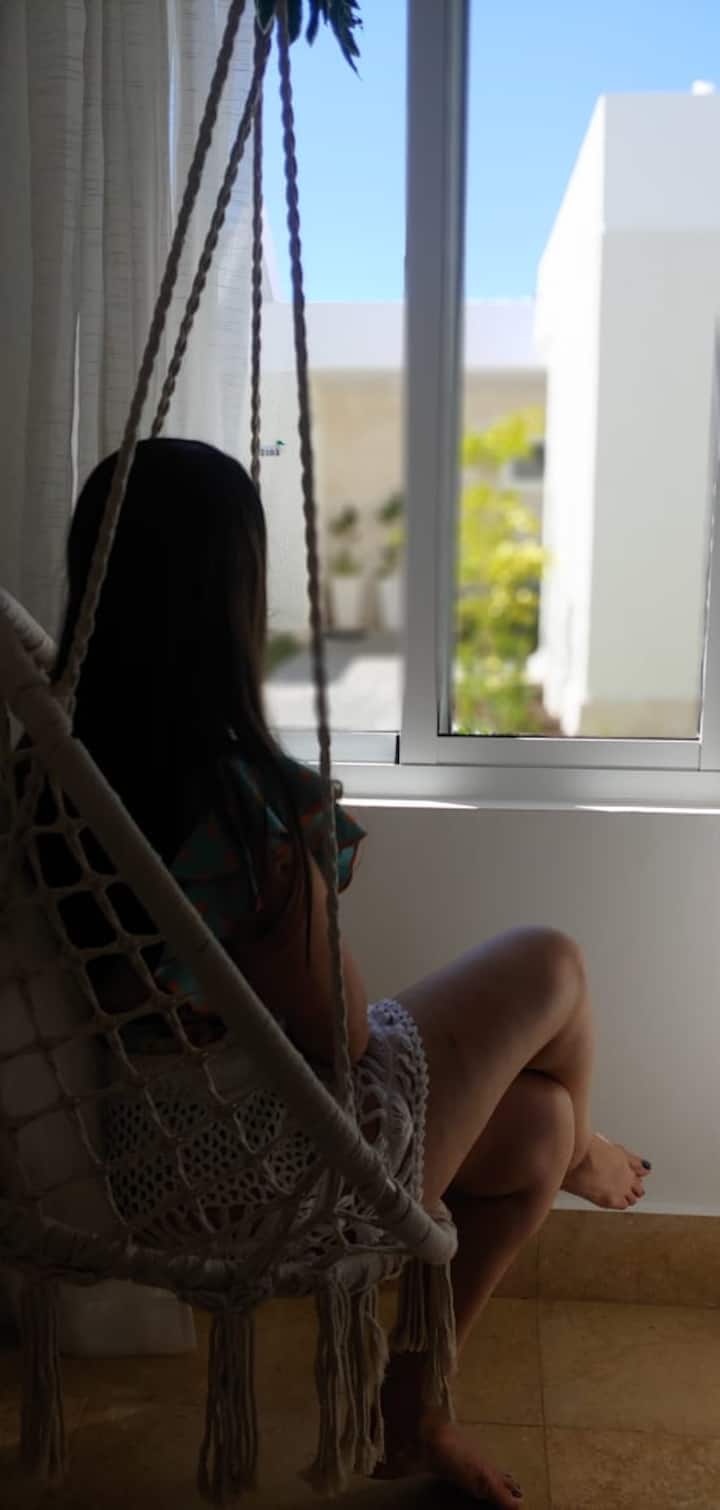 Lazy hammock chair, great spot for a good reading, enjoy your morning coffee or just relax with the blue sky view and green garden.