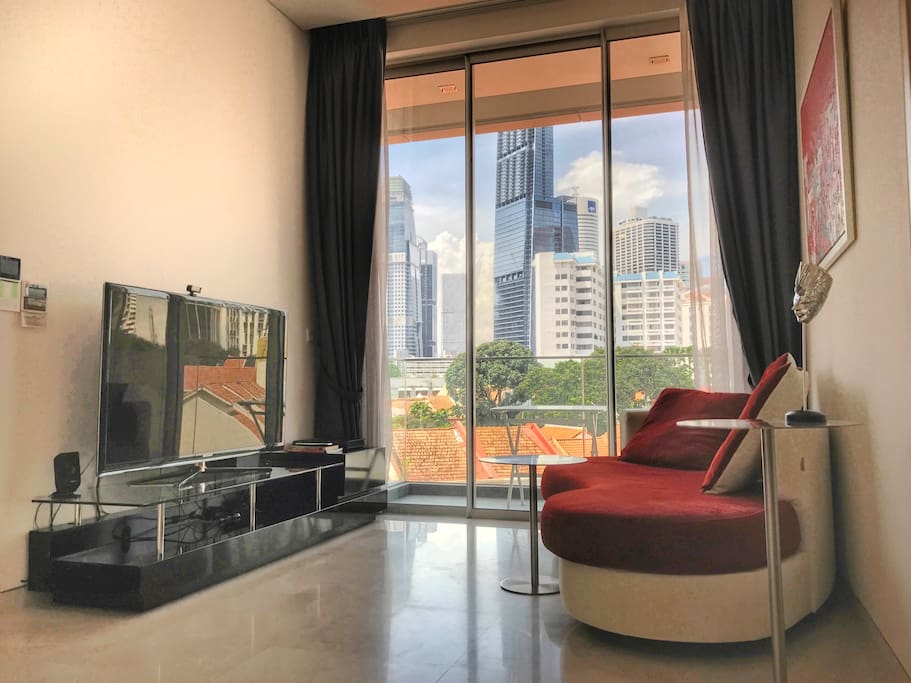 55' TV and designer furniture in a modern condo apartment