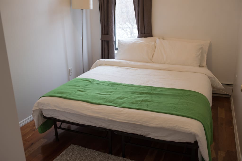 Room One with Queen Bed, closet and Mirror