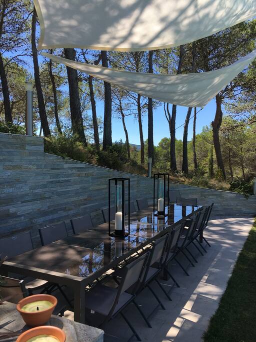 Dining by the pool under the sails.