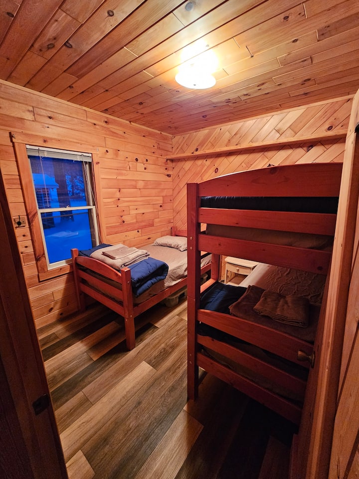 Bunk room with 3 twin beds.  Stack the kids up for a fun weekend or give the friends their own beds, you're sure to have some fun with a BUNK BED.
