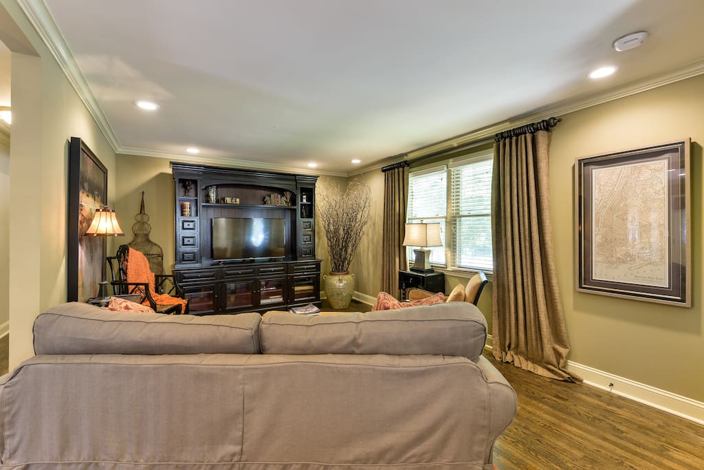 Kick back and relax with your favorite films in the living room.