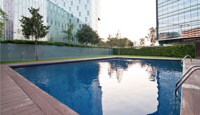 Sunny Attic with Pool and Terrace near the Beach!
