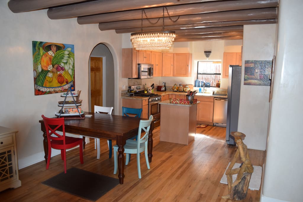 Living kitchen area is open and totally renovated.