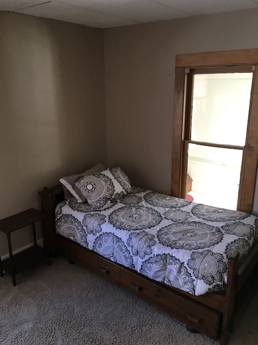 Comfy bed, linens and pillows provided