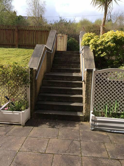 Few stairs at back where private carpark is