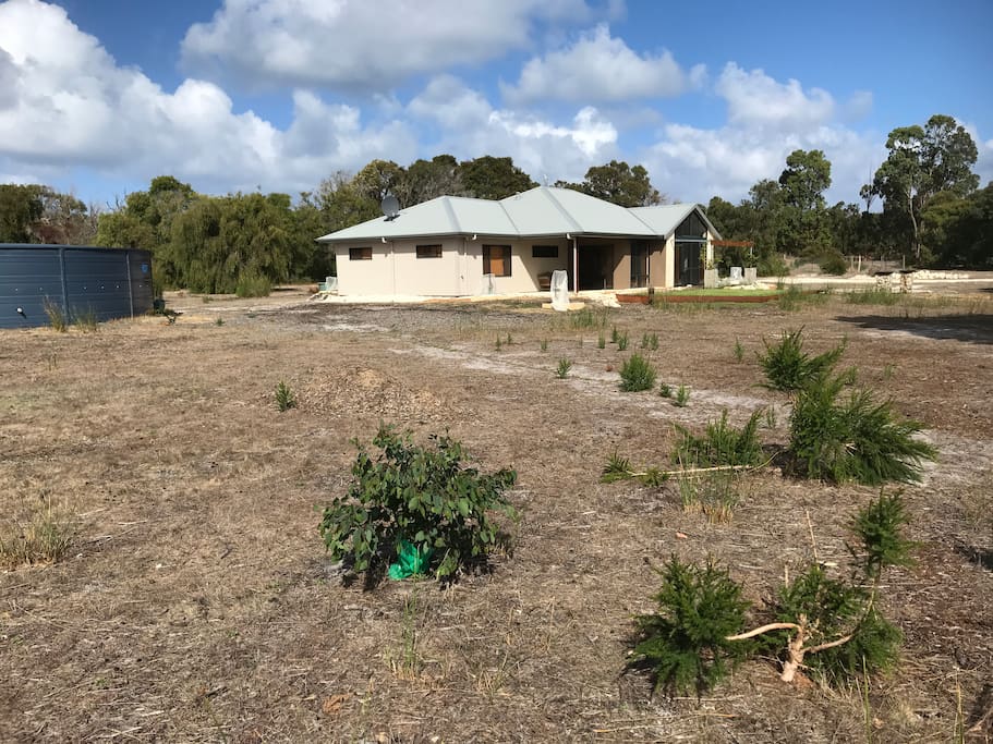 The house is set on Kilcarnup parklands , private , peaceful and abundant kangaroos and birds