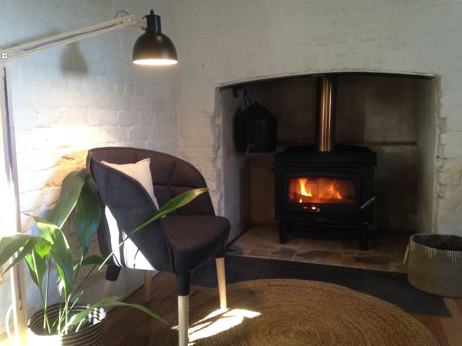 Woodheater makes it a cosy space (with backup electric heating)